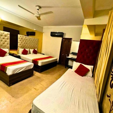 Doves Inn Hotel Kalma Chowk لاهور المظهر الخارجي الصورة
