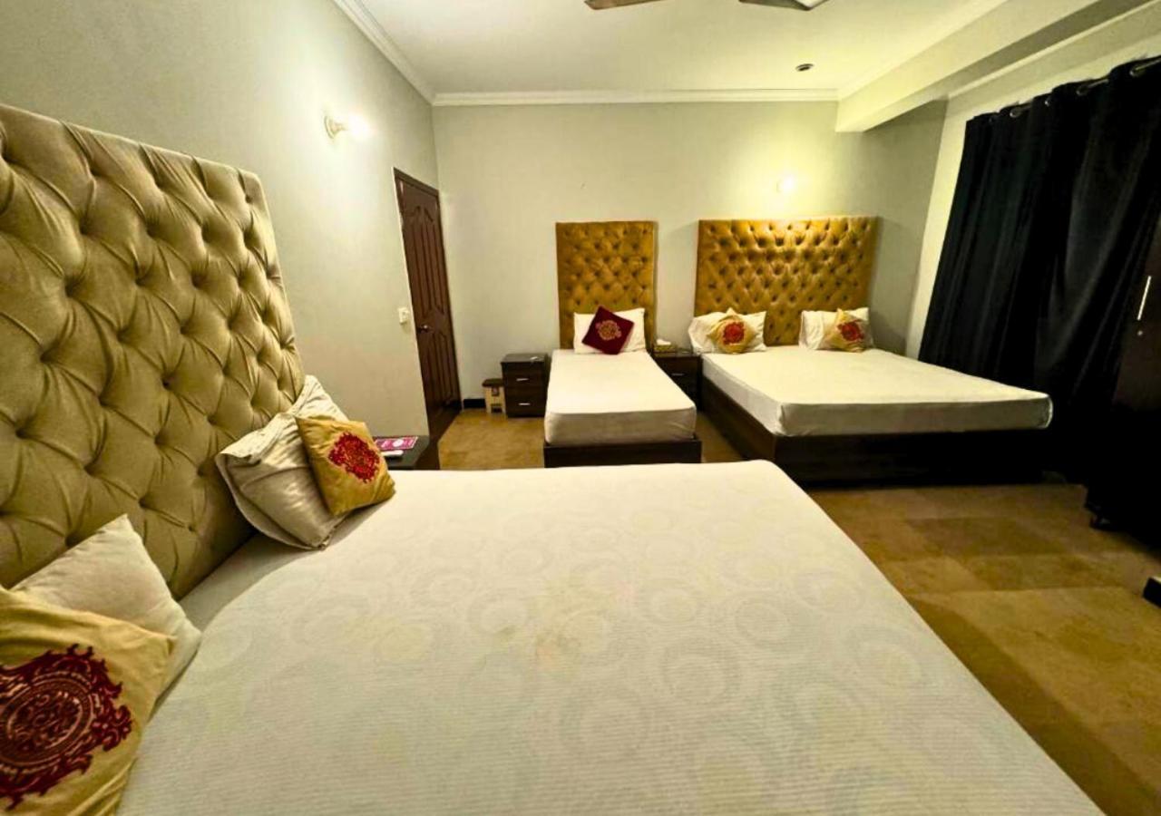 Doves Inn Hotel Kalma Chowk لاهور المظهر الخارجي الصورة